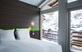 Double bed balcony Suite Room XXL Hotel Ormelune Val d'Isere
