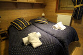 A twin bedroom at the Ferme du Val Claret 