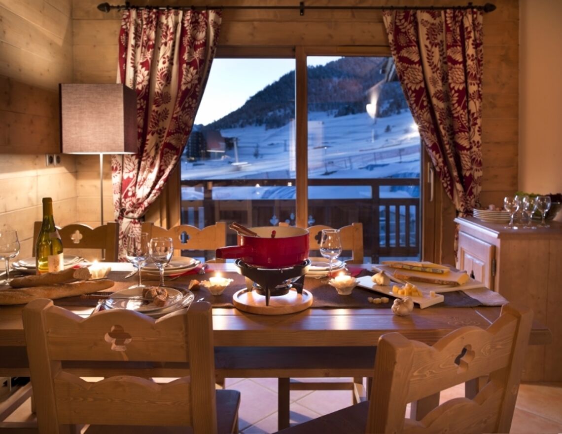 An example of what a dining room might look like in an apartment in L'Oree des Neiges, Vallandry, France