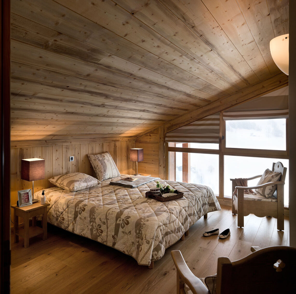 An example of a double bedroom in an apartment in Le Village de Lessy, Le Grand-Bornand/Chinaillon, France