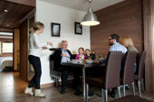 Eating as a family in an apartment at Le Centuare