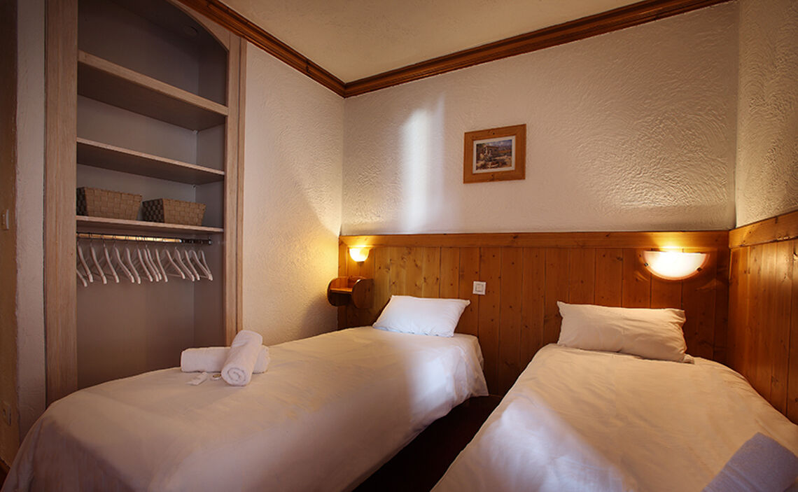 Twin bedroom in the Hermine