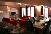 Cime des Arcs living area with set dining table