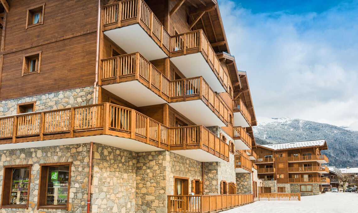 Exterior of Les Chalets de Layssia with local shop