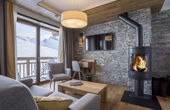 Alparena Junior suite living room with fireplace