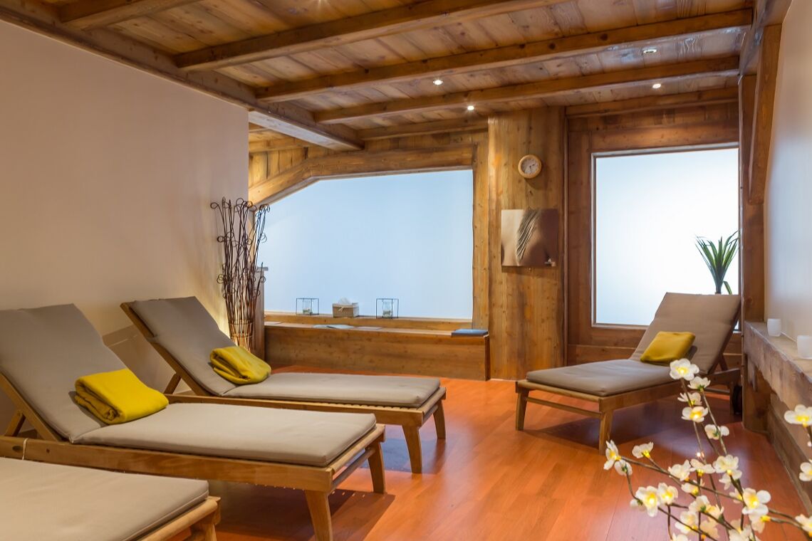 Loungers spa wellness area windows Les Alpages de Reberty Pierre et Vacances Les Menuires