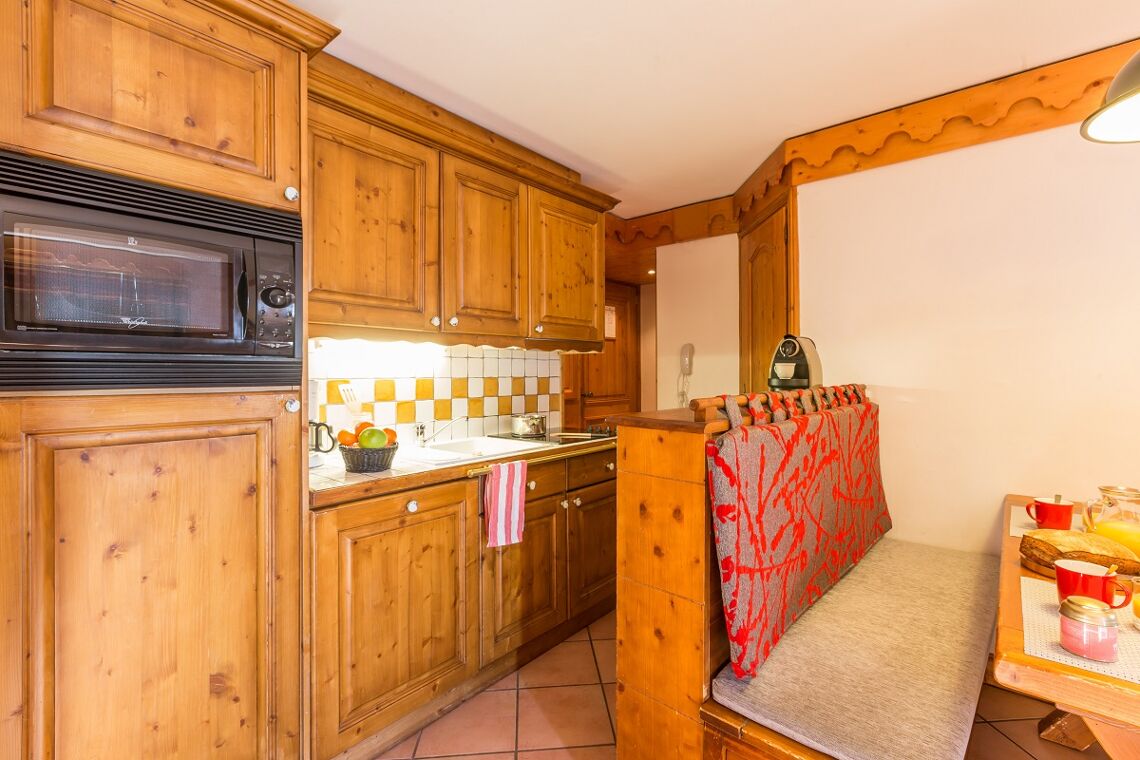 Bright modern wooden apartment kitchen Les Alpages de Reberty Les Menuires