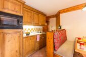Bright modern wooden apartment kitchen Les Alpages de Reberty Les Menuires