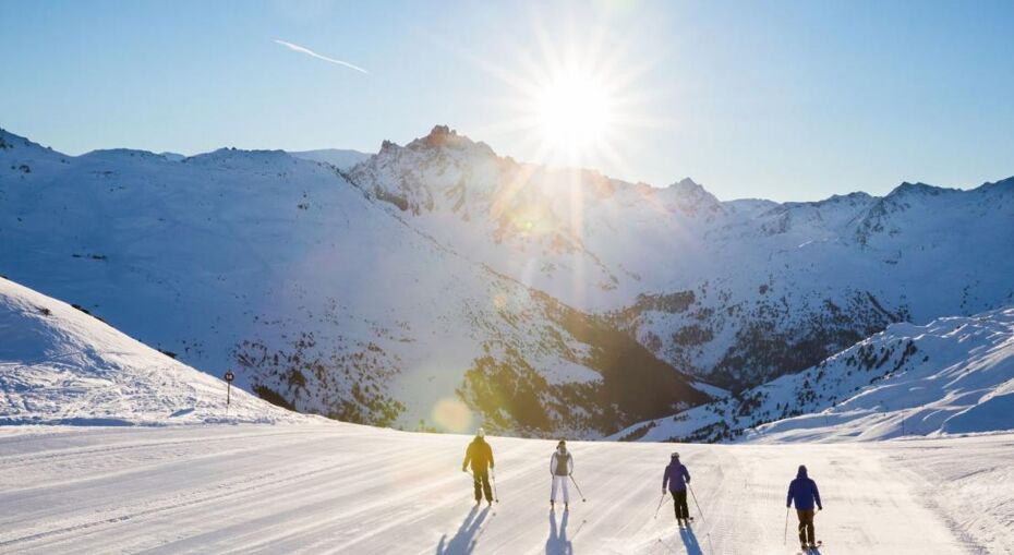 Meribel sunset skiers
