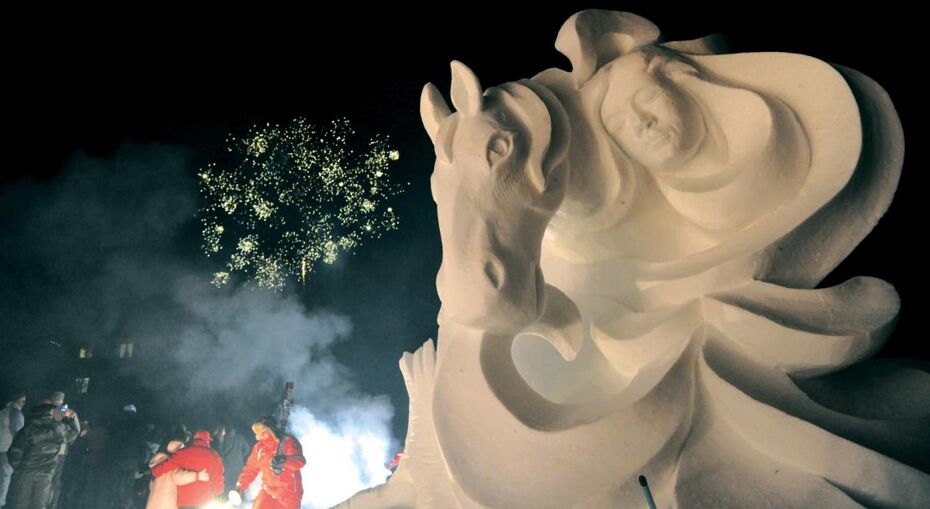 Ice sculpture at night in Valloire