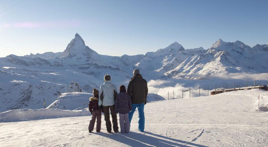 Family views the Matterhorn in Zermatt